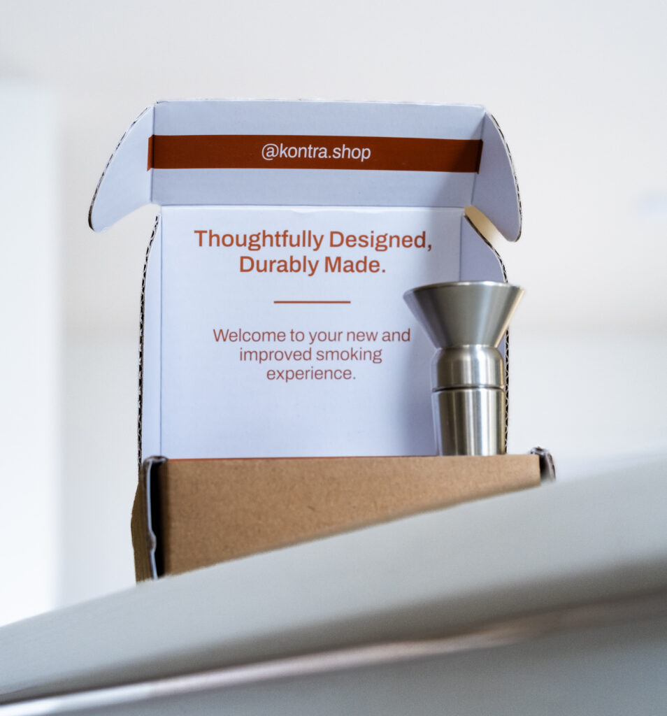 METTLE and the accompanying packaging atop a plastic table